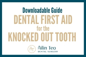 explain the first aid procedure for saving a tooth that has been knocked out